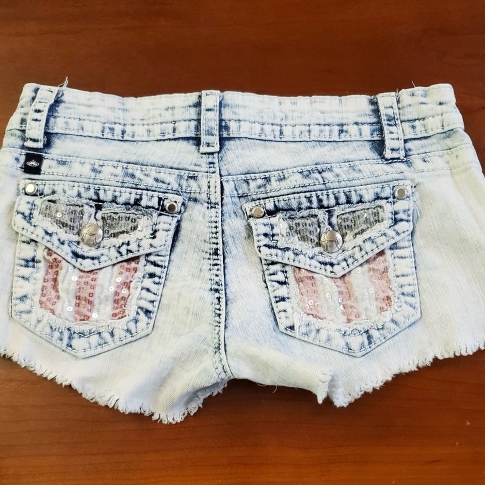 Almost Famous Light Blue Jean Shorts are a junior size 1. - Picture 6 of 10